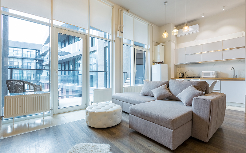 An image of a bright-looking condo living room.