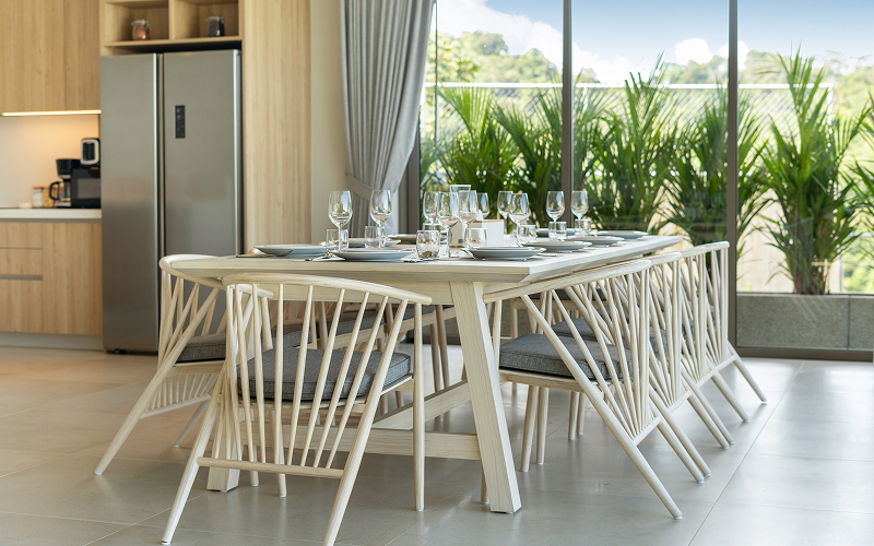 An image of a dining area with bench seating or extendable table