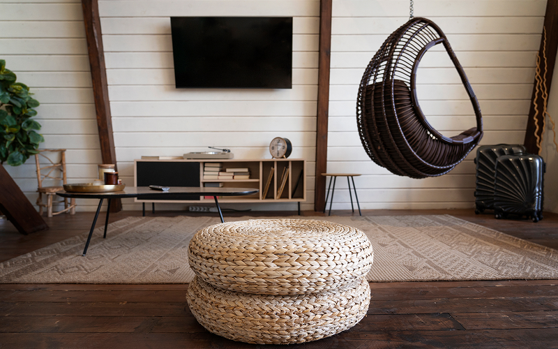 An image of a living room raw wood décor.